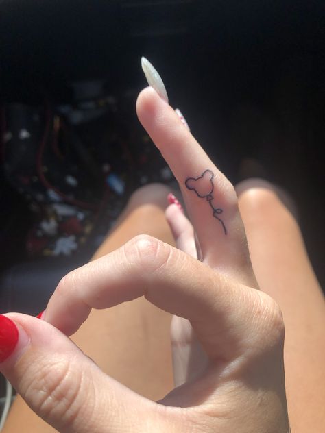 Mickey Finger Tattoo, Behind The Ear Tattoo Ideas Disney, Classy Disney Tattoos, Simplistic Disney Tattoo, Finger Tattoos Disney, Minnie Ear Tattoo, Disney Tattoos Small Matching, Dainty Disney Tattoos For Women, Small Simple Disney Tattoos