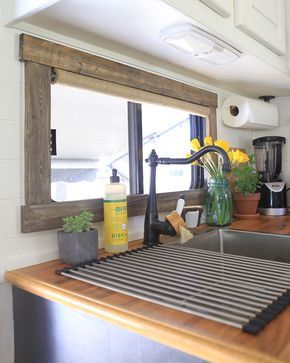 Come see how easy it is to frame RV windows to create a cozier vibe inside your tiny home on wheels! MountainModernLife.com Camper Organization Travel Trailers, Rv Windows, Camper Windows, Camper Trailer Remodel, Camper Organization, Rv Renovation, Camper Hacks, Diy Camper Remodel, Rv Makeover