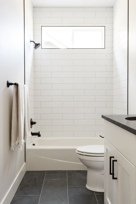 White Bathtub Shower Combo, Subway Tile Shower With Tub, Bath Tub Shower Tile Ideas, Black And White Bathtub Tile, Kids Bathtub Ideas, Tub Tile Ideas Bathtubs, Large Tile Shower Ideas Tub Surround, Kids Bathroom Floor Tile, Shower Tub Tile Ideas