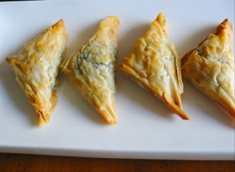 Kittencal s Greek Spinach and Feta Puff Pastry Triangles from Food.com:   								I have been making these for years for my get togethers and I sometimes make these using phyllo dough but puff pastry is really just as good and more convenient --- I sometimes add in roasted garlic into the spinach mixture and also a pinch of cayenne pepper for a bit of heat --- these are so good and make wonderful appetizers! Feta Puff Pastry, Spinach Puff Pastry, Greek Spinach, Bruschetta Ingredients, Top Chicken Recipes, Spinach Feta, Phyllo Dough, Homemade Tacos, Homemade Taco Seasoning