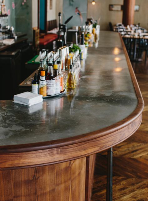 A simple, small space packed with surprising detail. See Skylar Morgan Furniture's work in oiled walnut on the bar and tambour entryway as well as banquettes, back bar shelving and bright, welcoming front doors. Brewery Bar Design, Bar Front Ideas, Restaurant Banquette, Wine Bistro, Bar Tile, Simple Cafe, Brewery Bar, Green Tile Bathroom, Bar Inspiration