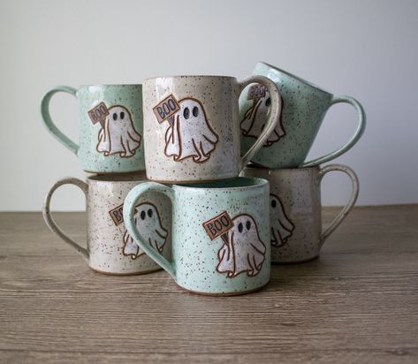 Boo! Oh sorry didn’t mean to scare you! Want a ghost mug? Link to my shop is in my bio! I’ve been a little bit of a ghost lately, but I’ve been working on a lot of exciting stuff for a shop update next week! Stay tuned for pics and more information on the update! #boo #ghostmug #pottery #ceramics #halloween #halloweendecor #fall #mugs Ceramics Halloween, Fall Mugs, Ceramic Ghost, Ghost Mug, Pottery Ceramics, Pottery Wheel, Pottery Pieces, Wheel Thrown, Tea Mugs