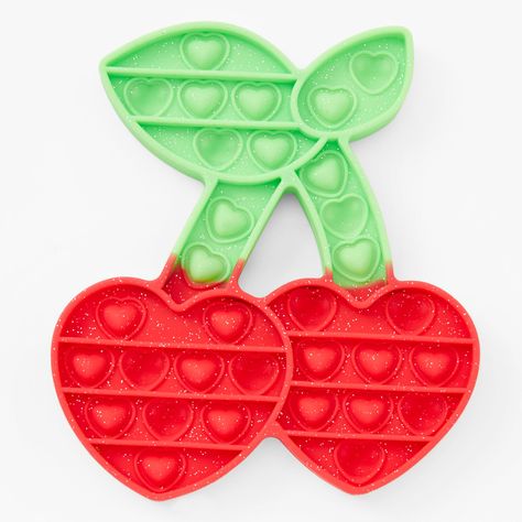 You asked, and now you shall receive. This year's biggest trend: fidget toys, are now available at Claire's! Take some time to mellow out and decompress with this cherry shaped & scented fidget toy. Push in, pop out, this silicone treat is the perfect toy for endless fidget sessions. Easy to use and with the ability to return to original form, simply flip the fidget toy over and restart your relaxation after all buttons are popped. So satisfying! Follow the trend, occupy your hands, and pop pop Figet Toys, Minimalist Furniture Design, Cool Fidget Toys, Pop Pop, So Satisfying, Barbie Birthday, Fashionable Jewelry, Fidget Toy, Pop Out