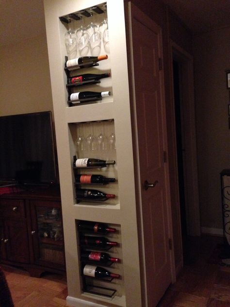 For my small condo we built this pantry with three recessed nooks. We decided to make use of the space between the studs and turned it into a wine rack and wine glass holder.  Wine rack built into my new pantry and I love it!  We used the idea (pin) where someone suggested using t-moulding to hold the wine glasses; works perfect. 11 bottles and eight wine glasses. Wine Rack Towel Holder, Between The Studs, Wine Glass Shelf, Glass Shelves In Bathroom, Glass Shelves Kitchen, Wine Rack Design, Built In Wine Rack, Floating Glass Shelves, Small Condo