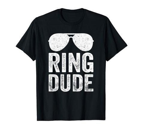 PRICES MAY VARY. Ring Dude Funny Ring Bearer Tshirt.Is your child the ring bearer of someone special's wedding? Or is a precious boy the ring dude of your big day? Perfect for rehearsal dinners and wedding receptions and parties. Funny Ring Bearer Tshirt. This wedding party member has one of the most important jobs, securing the Ring! It's a great gift to make him feel important, as well as for priceless pictures with the bride and groom. Lightweight, Classic fit, Double-needle sleeve and bottom Ring Security, Funny Wedding, Tshirt Funny, Ring Bearer, Men T Shirt, Funny T Shirt, T Shirt Funny, The Bride, Sunglasses