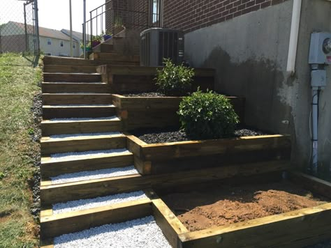 Slopes and hillsides always provide for a challenge in landscaping and pathways. This imgur gallery shares one great looking and functional solution. A brief project how to… Here’s the side yard on a slope overgrown with weeds and “steps” overdue for replacing. See how the air handler hangs precariously. First you need to gather supplies … Sloped Backyard Landscaping, Landscaping A Slope, Landscape Stairs, Side Yard Landscaping, Sloped Yard, Sloped Backyard, Side Yards, Landscaping Retaining Walls, Garden Stairs