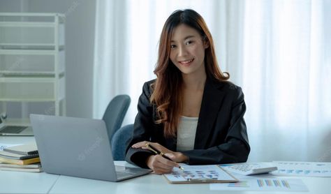 Premium Photo | Charming asian woman working at the office using a laptop looking at the cameraxa Romanian Women, Accounting Firm, White Photo Frames, Female Directors, Female Office, Work Pictures, Office Pictures, Office Outfits Women, Service Women