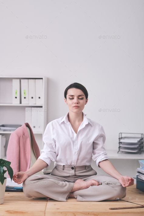 Calm businesswoman meditating in office by Pressmaster. Calm young businesswoman with closed eyes sitting in zen-like position and meditating in office #AD #office, #Pressmaster, #meditating, #Calm Zen Meditation, Closed Eyes, Dream Life, Business Women, Zen, Meditation, Spirituality, Mindfulness, Quick Saves