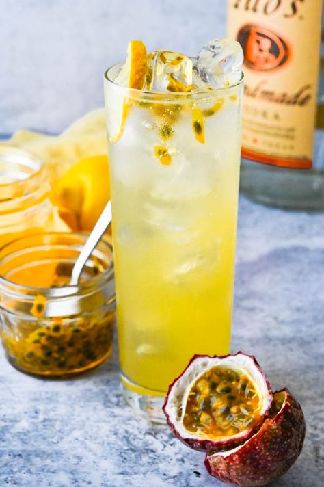 This quick and easy homemade passion fruit vodka soda cocktail is a tropical, quenching summer drink made with passion fruit simple syrup, fresh lemon juice, vodka and sparkling water or club soda. Make it by the glass or by the pitcher for a simple, fresh, tropical summer sipper everyone loves. #passionfruitcocktail #vodkasoda Passionfruit Vodka Cocktail, Fruit Vodka Drinks, Fruit Simple Syrup, Vodka Soda Cocktails, Passionfruit Cocktail, Passionfruit Recipes, Water With Lemon, Easy Summer Cocktails, Drinking Hot Water