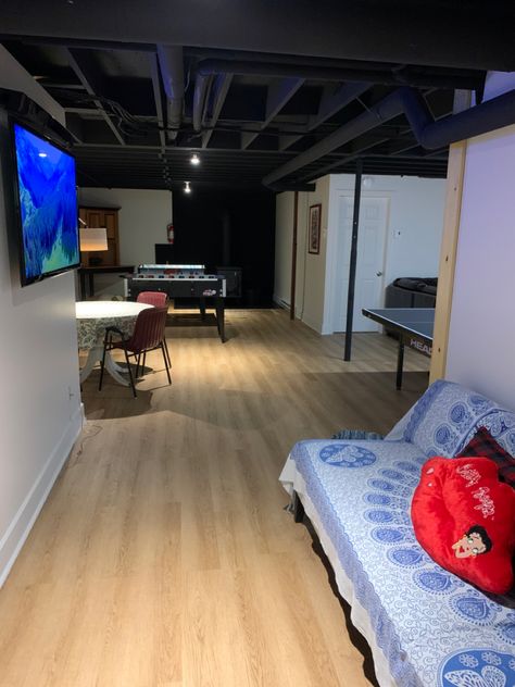 Bare ceilings painted black , wires and all. Black Ceilings, Painted Ceilings, Basement Living, Game Room Basement, Basement Finishing, Basement Living Rooms, Van Conversions, Basement Ceiling, Black Ceiling