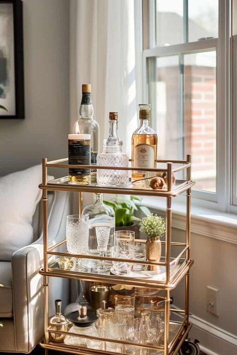 Bar carts are a great alternative to stationary wet and dry bars. These vintage bar cart styles will bring a classy, fun look to your home. Vintage Bar Cart Styling, Bar Cart Decor Ideas, Globe Bar, Modern Bar Cart, Home Bar Areas, Nautical Theme Decor, Glass Bar Cart, Vintage Bar Carts, Bar Cart Styling