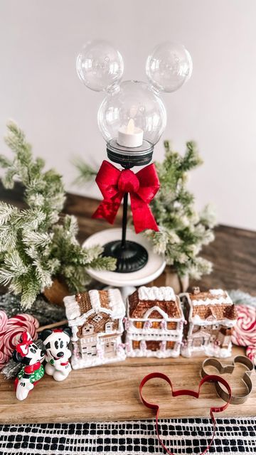 Lesley Thomas on Instagram: "🕯️Dollar 25 Tree Mickey lamp post 🕯️ ✅ INSPO for the globe portion of this craft came from @thepinkjasmin and I added the other elements to flip it to a lamp post. For about $7 and 15 minutes of time you will have the cutest craft everrrr. Any skill level can do this one. 🕯️SUPPLIES🕯️ ✅ candlestick @dollartree Christmas section ✅bow @dollartree ✅tea light @dollartree ✅ black craft ribbon @dollar tree ✅snow globe @dollartree ✅clear ornaments @dollartree ✅hot Disney Christmas Decorations Diy, Disney Christmas Crafts, Disney Candy, Disney Christmas Decorations, Black Craft, Christmas Mickey, Christmas Disney, Clear Ornaments, Dollar Tree Christmas