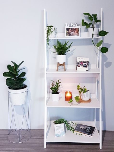 White Standing Shelf, White Ladder Shelf Decor Living Room, White Ladder Shelf Decor Bedroom, Aesthetic Ladder Shelf, Standing Shelf Decor Bedroom, Ladder Shelf Aesthetic, Ladder Shelf Decor Bedroom, White Bookshelf Decor, White Ladder Shelf