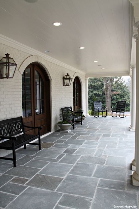 modern farmhouse atlanta004. Two arched French doors lead into the dining room from the front porch. Arched French Doors, Veranda Design, Farmhouse Porch Decor, Side Walk, Driveway Ideas, Porch Tile, Farmhouse Patio, Concrete Patios, Building A Porch