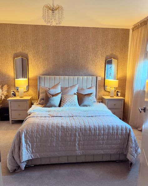 The only trouble with making a cosy bedroom is you never want to get up 🤎 Bedding - @dusk.com Curtains - @ikeauk Blind - @blinds2go Bedside tables - @ikea upcycled with @makeitrustoleum Hessian Mirrors and lamps - @therangeuk Wallpaper - @dcopro embellished silk in gold #cosybedroom #bedroom #bedroomdecor #bedroominspo #bedroomideas #budgetbedroom #bedroomdecor #texturedwallpaper #wallpaper #neutralbedroom #neutralshades #bedding #duskbedding #panelbed #bedroomgoals #cosyroom #bedsidet... Mirror Behind Bedside Table, Mirrors Behind Bedside Tables, Mirrors Behind Nightstand, Mirrors Behind Nightstand Ideas, Mirror Behind Nightstand, Bedside Table Ikea, Nightstand Ideas, Cosy Bedroom, Budget Bedroom