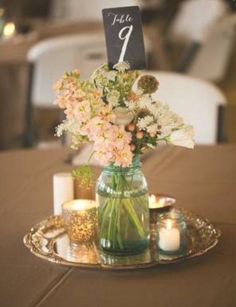 Silver charger plates to tie the center piece together. Maybe we can rent these with the table linens. Chargers Plates Table Setting, Silver Charger Plates, Round Wedding Tables, Charger Ideas, Charger Plates Wedding, Blue Winter Wedding, Simple Hairstyle, Birthday Party Centerpieces, Short Hair Ideas