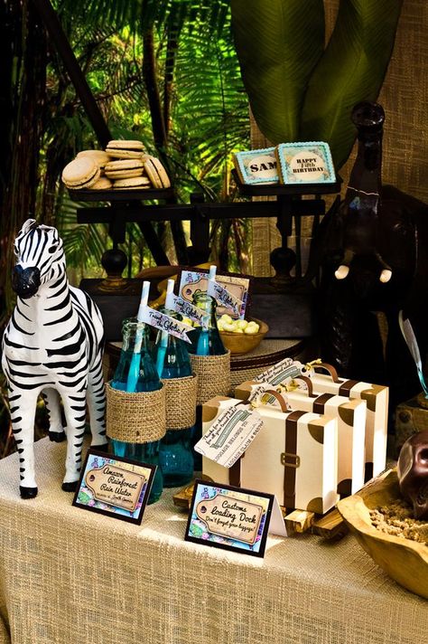 Disney World's "Jungle Safari Adventure" Ride Inspired Party with Lots of Really Cute Ideas via Kara's Party Ideas | KarasPartyIdeas.com #Sa... Adventure Party Ideas, Map Banner, Safari Themed Birthday Party, Globe Cake, Adventure Party, Jungle Cruise, Jungle Birthday Party, Zoo Party, Jungle Baby Shower Theme