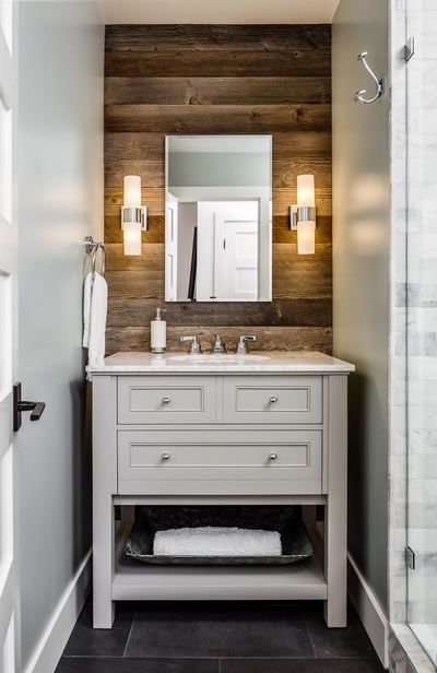 Modern Farmhouse Reclaimed Wood Bathroom Vanity Wall #farmhousedecor #modernfarmhouse #modernfarmhousedecor #reclaimed #reclaimedwood #reclaimedfurnitureideas #reclaimedwoodprojects #reclaimedwoodfurniture #homedecor #homedecorideas #homedecormodern #homedecormodernfarmhouse Vanity Between Two Walls, Bathroom Design Wood, Wood Bathroom Vanity, Cottage Bathroom, Bathroom Wall Cabinets, Tiny House Bathroom, Tiny Bathrooms, Basement Bathroom, Trendy Bathroom