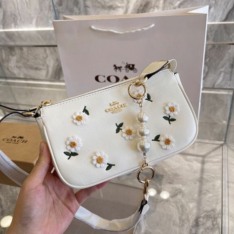 Coach sling bag ||COACH NOLITA DAISY APPLIQUE BAG Tas Coach, Shoe Locker, Coach Sling Bag, Coach Sling, Daisy Applique, Coach Nolita, Daisy Bags, Wedding Dr, Luxury Bags Collection