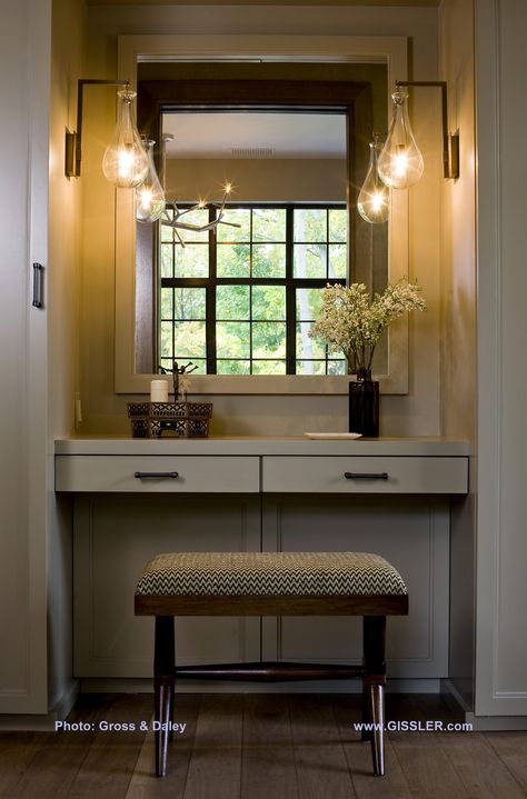 A steel casement window in an adjacent room reflects in the mirror at this built-in dressing table.The Patrick Naggar wall sconces are from Ralph Pucci Dressing Table Under Window, Dressing Table In Bathroom, Victorian Dressing Room, Built In Dressing Table, Wall Dressing Table, Bedroom Wardrobe Ideas, Ralph Pucci, Victorian House Interiors, Next Bedroom