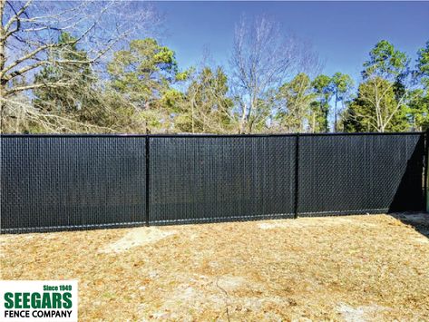 Black Chain Link Fence with Privacy Slats by Seegars Fence Company. https://www.seegarsfence.com/residential-fencing/chainlink-fencing Chain Link Slats, Black Chain Link Fence Landscaping, Chainlink Fence Privacy, Black Chain Link Fence Ideas, Black Chainlink Fence, Chainlink Fence Ideas, Chainlink Fence Makeover, Chain Link Fence Ideas Cover Up, Lawn Activities