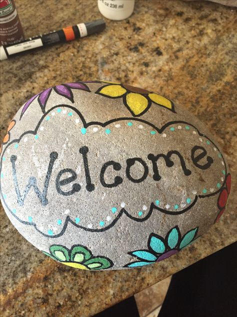 Painted welcome rock Welcome Rocks Painted, Welcome Stones Painted, Welcome Rock Painting Ideas, Welcome Rock Painting, Welcome Painted Rocks Front Doors, Stone Welcome Sign Painted Rocks, Hope Rocks Painted Stones, Painted Initials, Rock Concert Painted Rocks