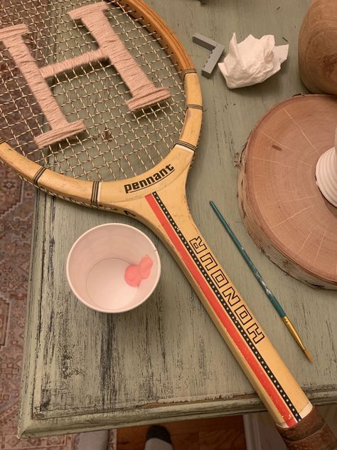 Painted Tennis Racket, Decorating With Vintage Tennis Rackets, Embroidered Tennis Racket, Tennis Racket On Wall, Tennis Racket Art Wall Decor, Fun Wall Decor Ideas, Tennis Racket Wall Decor, Tennis Room Decor, Vintage Tennis Racket Decor