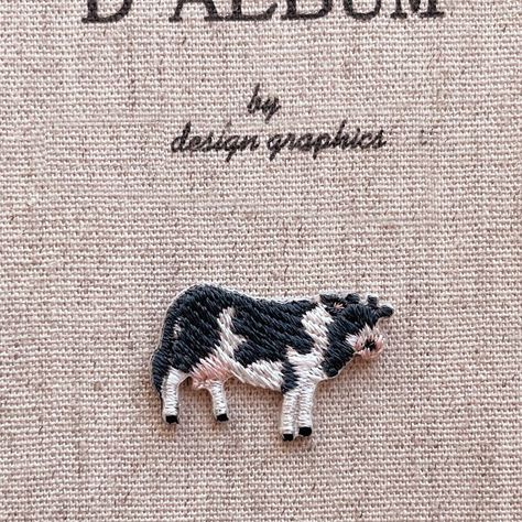 Measure approx.  :  28 X 16 mm  ( 1.1 x 0.6 inch ) Iron-On Steps: 1. Preheat iron to the highest setting for 5 minutes 2. Place cloth or white T-shirt over the patch and iron for at least 25 seconds 3. Flip jacket over and iron the opposite side (be sure to add firm pressure) 4. Let the jacket cool for 1 minute 5. Double check the patch is secure and repeat any steps if necessary Polyester fabrics should be extra careful because applying the high heat required for ironing may burn or discolor th Embroidered Cow, Cow Embroidery Design, Cow Embroidery, Cow Applique, Tiny Embroidery, Embroidery Napkins, Small Cow, Name Drawings, Baby Sewing Projects