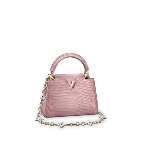 Capucines Mini Lezard - Handbags | LOUIS VUITTON Louis Vuitton Capucines Mini, Capucines Mini, Louis Vuitton Capucines, Handbags Louis Vuitton, Light Gold Color, Fancy Bags, Antique Pink, Louis Vuitton Official, Vuitton Bag