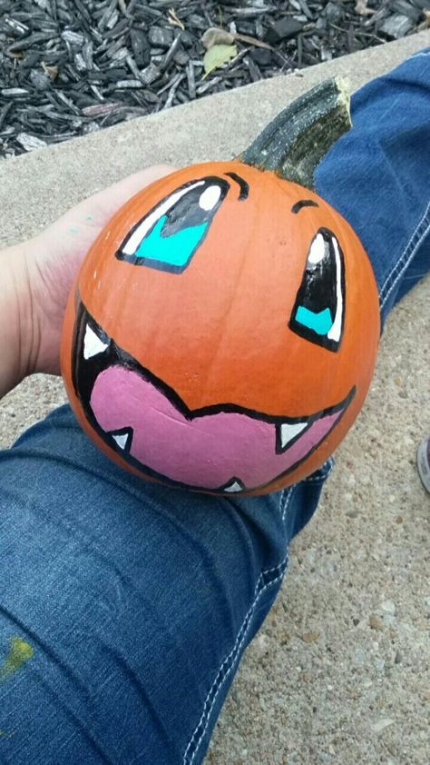 Cute Charmander Pumpkin I did myself! All you need is a black paint pen, some blue paint, white paint and a pink for the tongue! I bought all the paint at Menards: ) #pumpkin #Halloween #pokemon #paintingpumpkin credit goes to Samantha Adamo-Apodaca Charmander Pumpkin Painting, Pumpkin Painting Ideas Pokemon, Painting Ideas Pokemon, Charmander Pumpkin, Pokemon Pumpkin Painting, Pokemon Pumpkins, Mini Pumpkin Painting Ideas, Cute Charmander, Mini Pumpkin Painting