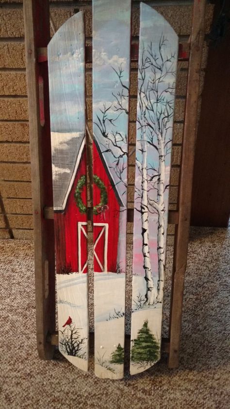 Painted Christmas Scenes On Wood, Painted Sleds Ideas, Sled Painting Ideas, Painted Sleds For Christmas, Sled Decorating Ideas Diy, Saw Blade Art, Painted Sleds, Christmas Sled Decoration, Barn Wood Art