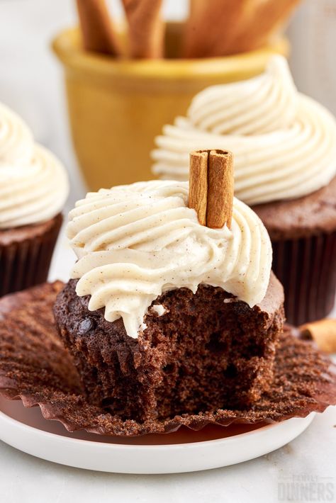 Delicious Mexican hot chocolate cupcakes with just a subtle hint of cinnamon and cayenne are quick and easy to make and taste incredible. These Mexican inspired cupcakes are inspired by Mexican hot chocolate. This easy chocolate cupcake recipe is made with a cake mix base. Skip the water and oil and follow these instructions for a much better cake. These cupcakes are perfect as birthday cupcakes, cinco de mayo dessert cupcakes, dia de los muertos dessert, Christmas dessert and more.