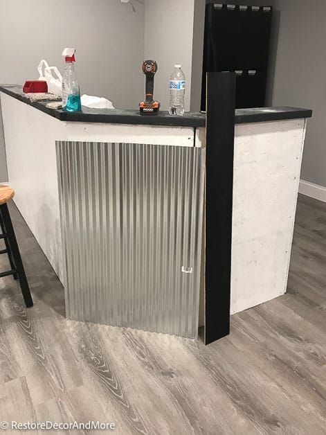 Under Bar Wall Ideas, Diy Bar Top Ideas, Corrugated Metal Bar, Diy Dry Bar, Bar Wall Ideas, Industrial Bar Design, Finished Basement Bars, Pipe Towel Bar, Building A Basement