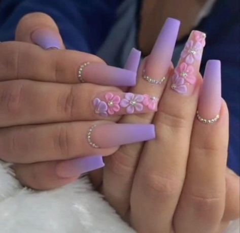 Pink Nails With Purple Flowers, Ombre And Flower Nails, Purple Ombre Nails With Rhinestones, Purple 3d Flower Acrylic Nails, Repunzel Quince Theme Nails, Acrylic Nails Purple Lavender Butterfly, Purple Nail Designs With Flowers, Pink And Purple Flower Nails, Purple And Pink Quinceanera Ideas