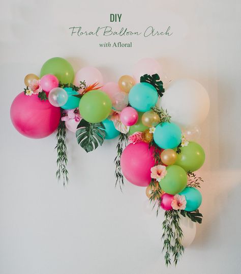 This gorgeous and colorful ballon arch is easy and affordable! Mix in florals + leaves for added elegance. Fancy Halloween or Fall inspired decor? Change out the bright pink, turquoise and lime hues for merlot, burgundy, dark orange, rust, black and purple! Disney Moana Birthday Party, Floral Balloon Arch, Diy Ballon, Deco Ballon, Ballon Party, Floral Balloons, Moana Birthday Party, Fiesta Tropical, Tropical Birthday