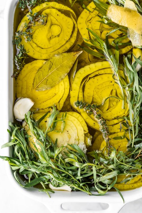 Fennel confit is a luscious and incredibly fragrant way to cook fennel. The slices are submerged in olive oil and slowly cooked with tarragon and lemon. Confit Recipes, Cooking With Fresh Herbs, Fennel Recipes, Carrot Cupcake, Flavored Olive Oil, Roasted Strawberries, Fennel Salad, Homemade Mayonnaise, Homemade Pesto