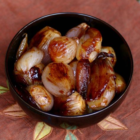 in Paris.  (note:  stick with medium to small sized shallots if you want the roasting time to be 15-20 minutes) ******************************************** 6 tablespoons unsalted butter 2 pounds fresh shallots, peeled, with roots intact 3 tablespoons sugar 3 tablespoons good red wine vinegar 1/2 teaspoon kosher salt 1/4 teaspoon freshly ground black pepper 2 tablespoons chopped fresh flat leaf parsley Preheat oven to 400 degrees.  Melt the butter in a 12-inch ovenproof saute pan, add t Shallot Recipes, Roasted Shallots, Caramelized Shallots, Clam Recipes, Pork Loin, Vegetable Sides, Banana Bread Recipes, Yummy Sides, Shallots