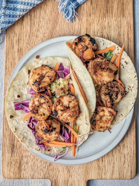 Enjoy our take on flavorful Caribbean jerk shrimp tacos marinated in a spicy, wet jerk marinade and grilled to perfection. Grilled Jerk Shrimp, Jerk Shrimp Tacos, Jerk Shrimp, Jerk Marinade, Fresh Mango Salsa, Spicy Gravy, Beef Lettuce Wraps, Pepper Shrimp, Gravy Ingredients