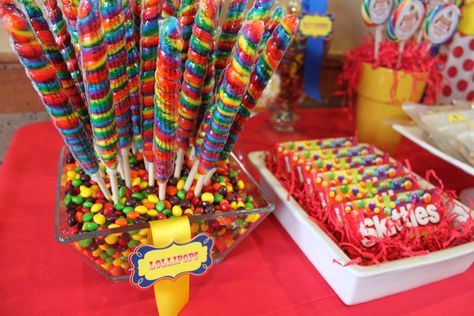 carnival cake table decorations | What circus party is complete without carnival games?! The celebration ... Carnival Party Decorations, Diy Carnival, Circus Theme Party, Carnival Food, Candy Display, Circus Birthday Party, Candyland Party, Carnival Birthday Parties, Rainbow Candy