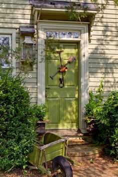 10 Ways to Create Curb Appeal - Town & Country Living Green Front Door Colors, Green Front Door, Green Front Doors, Door Colors, Storage Shed Plans, Living Modern, Front Door Colors, Green Door, Grunge Room