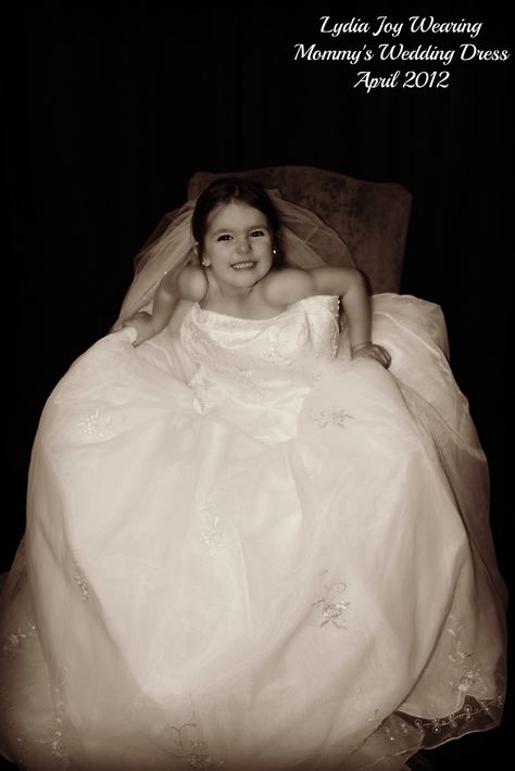 Take a photo of your daughter wearing your wedding dress, to display at her wedding.. This is my beautiful daughter Lydia Joy in my wedding dress Age 2. Daughter In Your Wedding Dress, Daughter And Wedding Dress Photo Ideas, Photos Of Daughter In Wedding Dress, Daughter In Wedding Dress Photo Shoot, Daughter In Moms Wedding Dress Photos, Newborn Family Photos, Mother Wedding Dress, My Beautiful Daughter, Wedding Dress Pictures