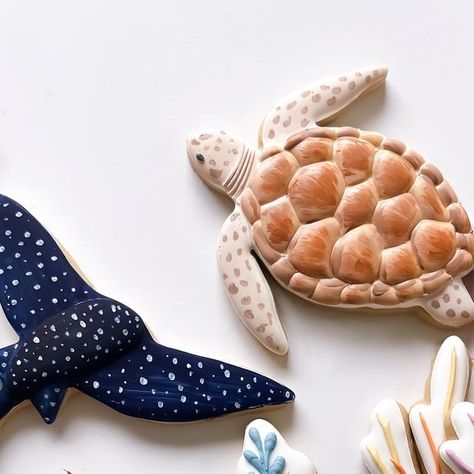 Geeji | Edible Artist on Instagram: "Happy Reef Week!! 💙  Is there any better way to celebrate than with cookies? 🤍   I had so much fun teaming up with @oceana_bze to create this fully edible cookie reef scene!! With all the beautiful marine life our reef offers, it was soooo hard choosing just a couple to include! 🥹  p.s. I also may or may not have spent way too much time eating all the coral tuile while I was learning how to make them 😅 . . . . . #cookies #sugarcookies #reefweek #oceana #oceanabelize #seacookies #coralreef #bakersofinstagram #bakersofig #royalicing #edibleart #bakersgonnabake #bakerlife #paintedcookies #foodies" Edible Coral Reef, Bakers Gonna Bake, Edible Cookies, The Coral, Icing Cookies, Edible Art, Creative Cakes, Artist On Instagram, Royal Icing