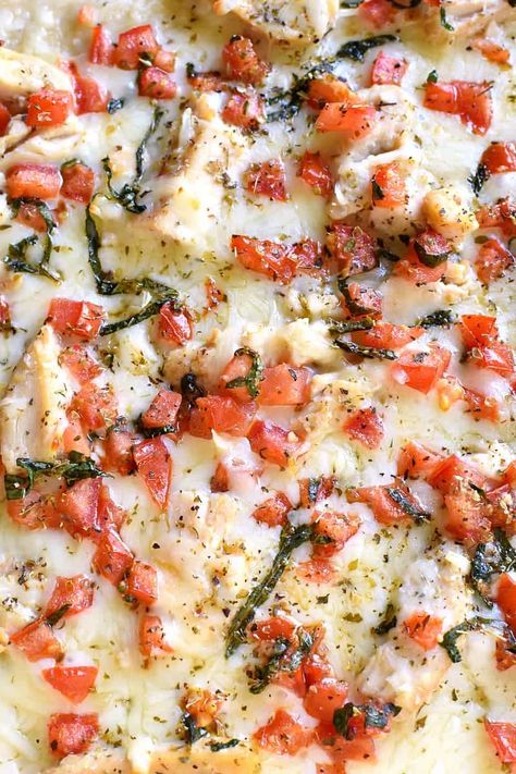 This Bruschetta Chicken Alfredo Pizza is a little taste of Italy, right in your own kitchen! Packed with delicious flavor and ready in under 30 minutes, this pizza is perfect for family night, date night, or a fun night with friends! Bruschetta Chicken Alfredo Pizza, Blackstone Pizza, Chicken Alfredo Pizza, Alfredo Pizza, Bruschetta Chicken, Easy Homemade Pizza, Night With Friends, Night Date, Pizza Recipes Homemade