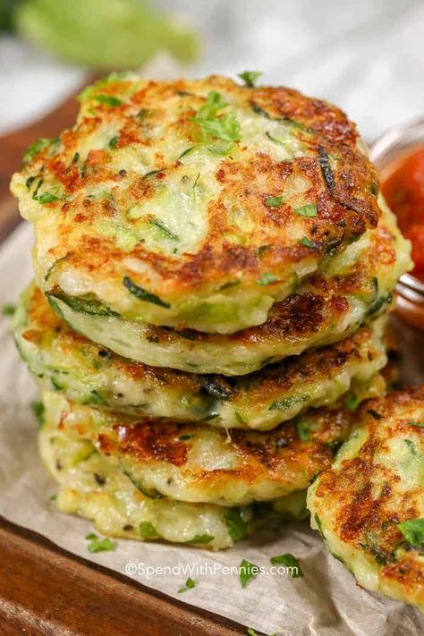 These zucchini panackes are one of my favorite snacks without all of the guilt! #spendwithpennies #zucchini #keto #snacks #zucchinipancakes #appetizer #easyappetizer #easyrecipe #easysnack Veggie Pancakes, Zucchini Fritters Recipe, Zucchini Pancakes, Fritters Recipe, Easy Zucchini, Zucchini Fritters, Bread Appetizers, Fritter Recipes, Zucchini Fries