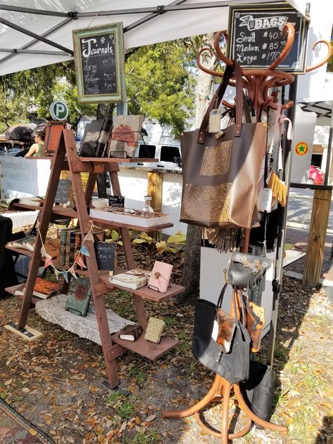 Leather Craft Show Display, Market Stall Bag Display, Leather Vendor Booth, Myra Bags Display, Rustic Market Stall, Rustic Stall Display, Market Stall Display Ideas, Market Stall Display, Booth Setup