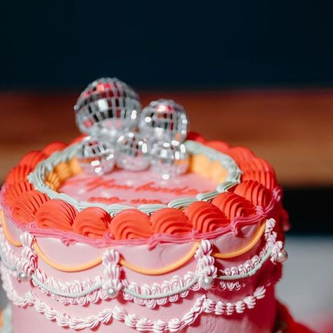 Ellie Gillard on Instagram: "Wedding cake of dreams. I don’t think I’ve ever had as many DMs about a wedding cake as I did about this one. So I figured it deserved a place on the grid. Hollie & Sam’s awesome pink retro style cake with mirror balls from @virgo.bakery.norwich Flowers by @posy_flwrs" Retro Heart Wedding Cake, Quirky Wedding Cake, Colorful Wedding Cake, Retro Wedding Cakes, Colorful Wedding Cakes, Heart Wedding Cakes, Baking Stuff, December 01, Quirky Wedding