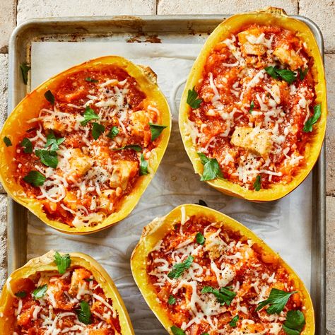 This filling, hearty stuffed spaghetti squash is a lower-carb version of your traditional chicken Parmesan with pasta. This chicken Parmesan recipe is still full of cheesy goodness, but has the added benefit of sweet winter squash. If you can't find two small squashes, use one (3-pound) squash and cut each half into two portions when ready to serve. Spaghetti Squash Recipes With Chicken, Spaghetti Squash Chicken Parmesan, Squash Meals, Spaghetti Squash Recipes Chicken, Recipes Spaghetti, Stuffed Spaghetti Squash, Parmesan Spaghetti, Stuffed Squash, Chicken Parmesan Recipe