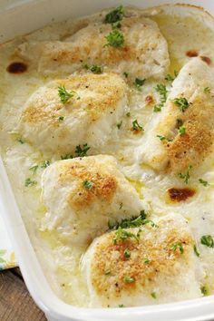 This baked cod is hands-down my favorite fish dish. It turns out perfectly flaky every time. The flavorful, creamy sauce puts it over the top! #TipsAndAdviceForBackPain Cod In Cream Sauce, Heat Spray, Cod Fillets, Cod Fish Recipes, Fish Recipes Baked, Resep Seafood, Recipes Fish, Fish Dinner Recipes, Valentine Recipes