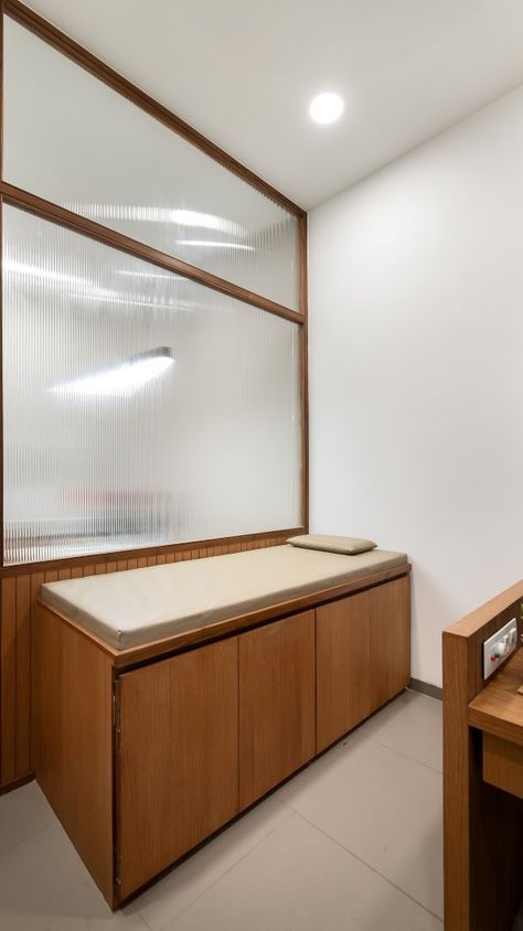 Doctor's Clinic Interior | Ananta interiors - The Architects Diary Doctor Cabin Table Design, Clinic Bed Design, Homoeopathic Clinic Design, Gynac Clinic Interior, Dr Cabin Interior, Opd Interior, Doctor Cabin Interior Design, Doctor Consulting Room, Doctor Room Design