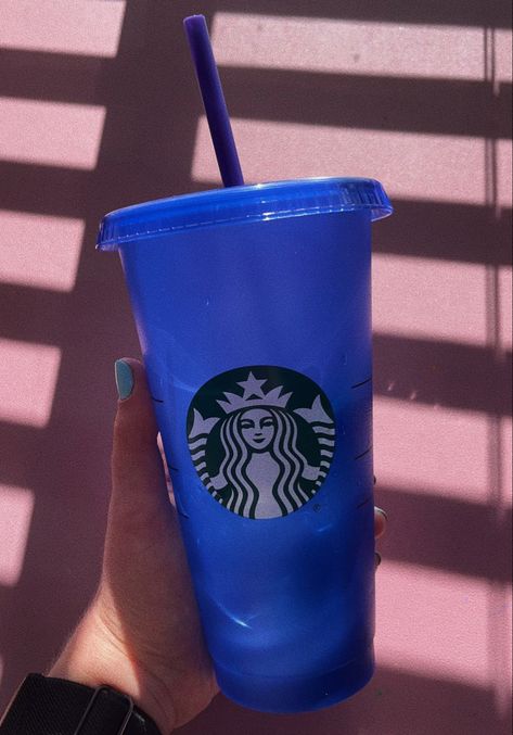 a dark blue starbucks cup being held above a pink background with the sun shining in the background Blue Starbucks Cup, Basket 2023, Blue Starbucks, Color Boards, Starbucks Cup, Starbucks Drinks, Starbucks Hot, Colour Board, Starbucks Cups